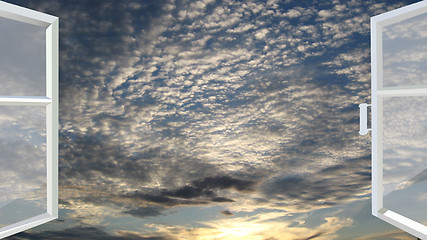 Image showing window opened to the sunset