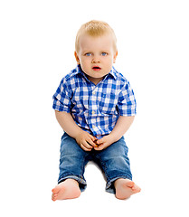 Image showing little boy in a plaid shirt and jeans