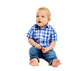 Image showing little boy in a plaid shirt and jeans