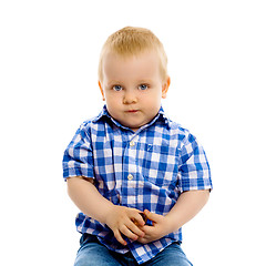 Image showing little boy in a plaid shirt and jeans