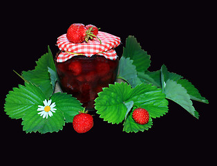 Image showing jar with strawberry jam and green leaves