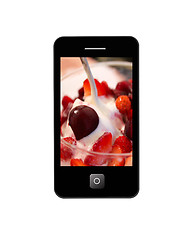 Image showing mobile phone with image of ice-cream with cherry