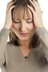 Image showing Attractive girl with headache