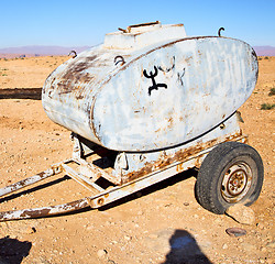 Image showing water tank in morocco africa land gray  metal weel and arid