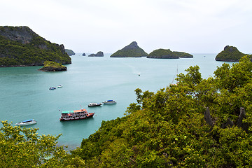 Image showing  boat coastline of a  green lagoon and    bay  