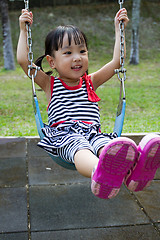 Image showing Asian Kid Swing At Park