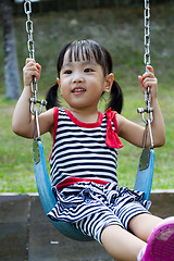 Image showing Asian Kid Swing At Park