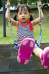 Image showing Asian Kid Swing At Park