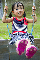 Image showing Asian Kid Swing At Park
