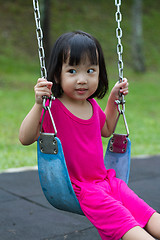 Image showing Asian Kid Swing At Park