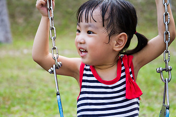 Image showing Asian Kid Swing At Park