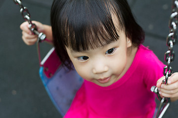 Image showing Asian Kid Swing At Park