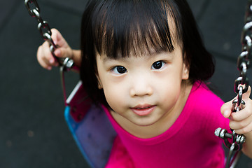 Image showing Asian Kid Swing At Park