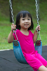 Image showing Asian Kid Swing At Park