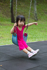 Image showing Asian Kid Swing At Park