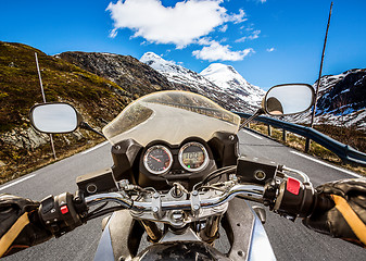 Image showing Biker First-person view, mountain serpentine.