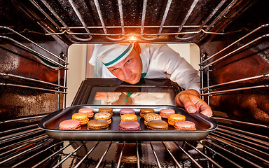 Image showing Chef cooking in the oven.