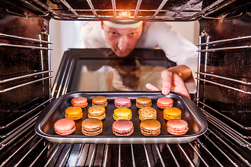 Image showing Chef cooking in the oven.