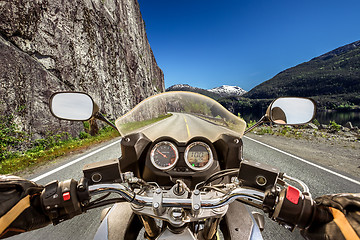 Image showing Biker First-person view, mountain serpentine.