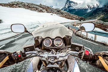 Image showing Biker First-person view, mountain serpentine.