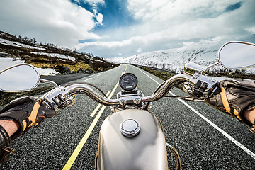 Image showing Biker First-person view, mountain serpentine.