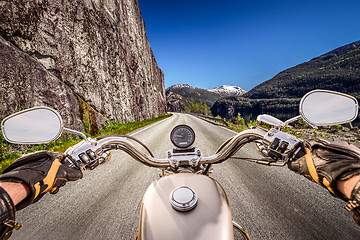 Image showing Biker First-person view, mountain serpentine.