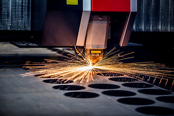 Image showing CNC Laser cutting of metal, modern industrial technology.