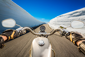 Image showing Biker First-person view, mountain serpentine.