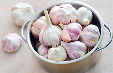 Image showing garlic in metal bowl on the table