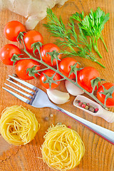 Image showing raw pasta and tomato