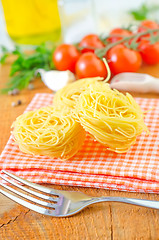 Image showing raw pasta and tomato