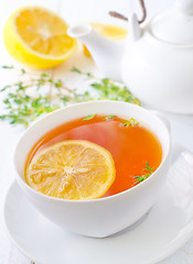 Image showing Fresh tea with lemon in the white cup