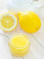 Image showing honey and lemons