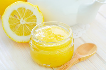 Image showing honey and lemons