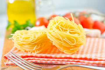 Image showing raw pasta and tomato