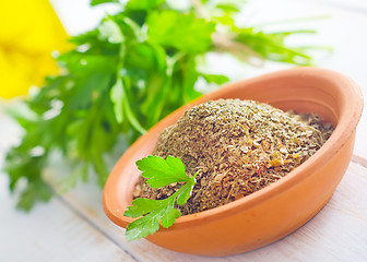 Image showing Dry parsley in the bowl, green parsley