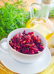 Image showing Fresh salad with beet and walnuts, vegetarian salad