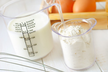 Image showing ingredients for dough, eggs, flour and milk
