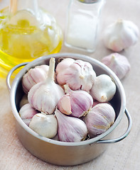 Image showing garlic in metal bowl on the table