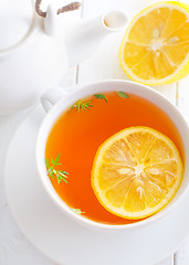 Image showing Fresh tea with lemon in the white cup