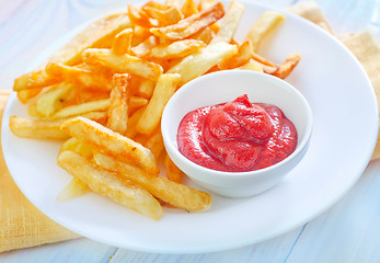 Image showing potato fries with sauce