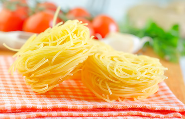 Image showing raw pasta and tomato