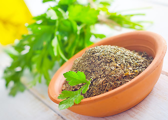 Image showing Dry parsley in the bowl, green parsley