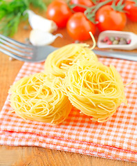 Image showing raw pasta and tomato