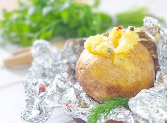 Image showing baked potato in foil