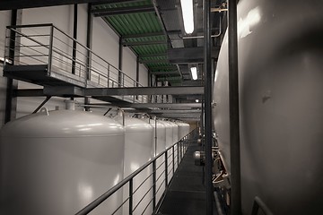 Image showing Large industrial white silos in modern factory