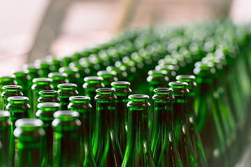 Image showing Many bottles on conveyor belt