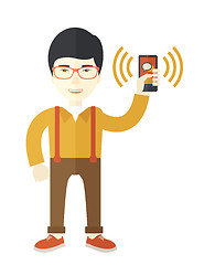 Image showing Office worker and his smartphone.