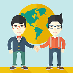 Image showing Two chinese guys happily handshaking.