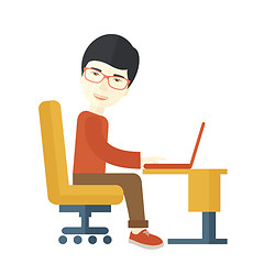 Image showing Japanese guy sitting infront his computer.